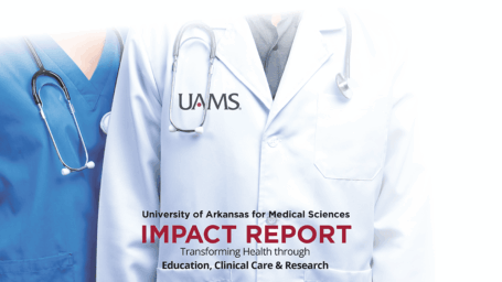 Close-up of two healthcare professionals—one wearing blue scrubs and one in a white coat with a stethoscope—standing side by side. Overlaid text reads “University of Arkansas for Medical Sciences – Impact Report: Transforming Health through Education, Clinical Care & Research,” with the UAMS logo centered on the white coat.