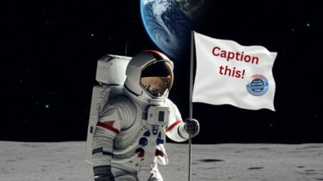 An astronaut stands on the moon with Earth visible behind him. He is holding a flag that says 